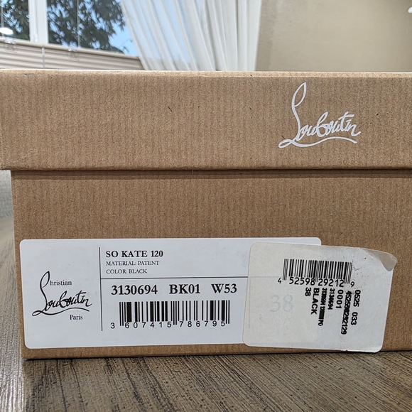 Christian Louboutin Glossy Red and Black Heels - Picture 2 of 13